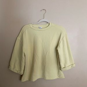 A new day yellow sweater